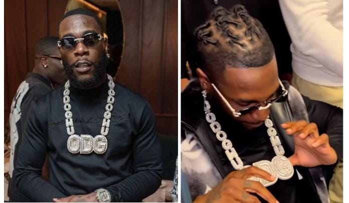 Burna Boy flaunts a $1 million 'Odogwu' diamond pendant._ghnation.net